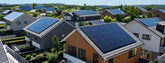 Modern Canadian neighborhood with professionally installed rooftop grid-tie solar systems – showcasing real-world residential adoption, clean energy use, and system scalability